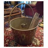 Large brass kettle with brass ladle