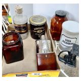 Flat with cigar jar, apothecary jars, flasks,