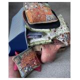 Huge stack of throw pillows, throws, placemats