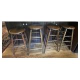 4 wooden stools --3 bar, 1 counter