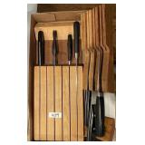 Box of assorted knives and storage