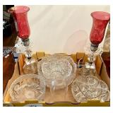 Flat with cranberry glass candle sconces,