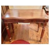 Antique flip top table in foyer