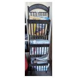 Easel back metal magazine rack with contents