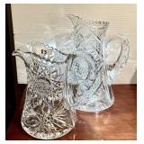 2 cut crystal pitchers --tallest is 10"