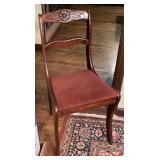 Antique carved rose back walnut side chair