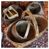 2 stacks of antique baskets