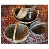 2 stacks of antique baskets