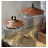 2 glass canister jars with tin lids
