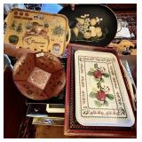 Large stack of metal and wood trays