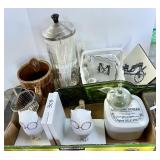 Flat with owl bookends, barbicide jar, pottery,