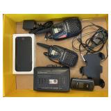 Flat with iPhone, flip phone, cassette player,