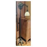 Wrought iron bridge lamp with glass shade
