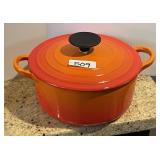 Orange Le Creuset pot with lid #8