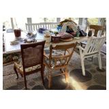 Chairs around table and contents on table