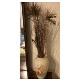 Vase with peacock feathers
