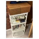 Plastic shelf with VHS movies and cassettes