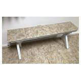 Wood bench with floor tile top