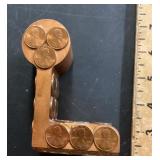 Piece of copper with pennies