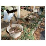 Pots and figures from flower bed out front