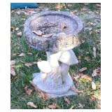 Concrete mushroom birdbath
