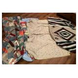 2 quilts and a woven throw