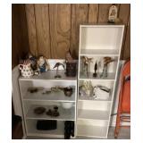 2 white shelves and contents