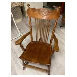 Vintage pressed back rocking chair