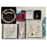 8 boxed costume jewelry