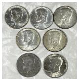 Seven 1966-1976 Kennedy half dollars