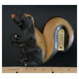 Skunk chalkware thermometer