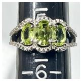 Sterling silver ring with 3 green stones