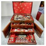 Brass decorated jewelry box with contents