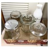 Flat with glass storage jars, milk glass bottle