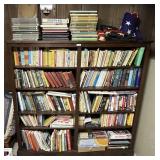Large wooden bookcase with contents