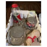 Flat with candy jars with tin lids, model plane,