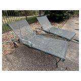 Pair of wrought iron chaise loungers