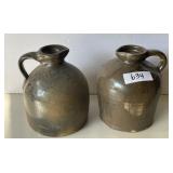 2 brown stoneware jugs 8" tall