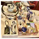 Large group of toiletries between sinks