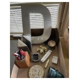 Flat with metal "D", stamp holder, bookends,