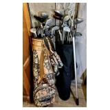 2 bags of assorted golf clubs