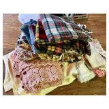 Stack of blankets, throws, linens