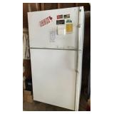 GE garage fridge --needs cleaning