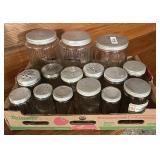 Flat of glass Hoosier jars with tin lids