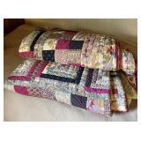 Pair of twin quilted comforters --hand quilted