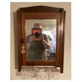 Antique medicine cabinet with towel bar