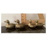 4 brass ducks
