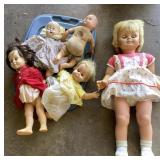 2 totes with old dolls