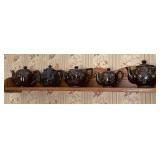 5 redware teapots