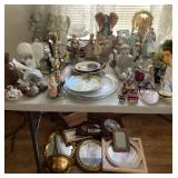 Home decor and dishes on and under table